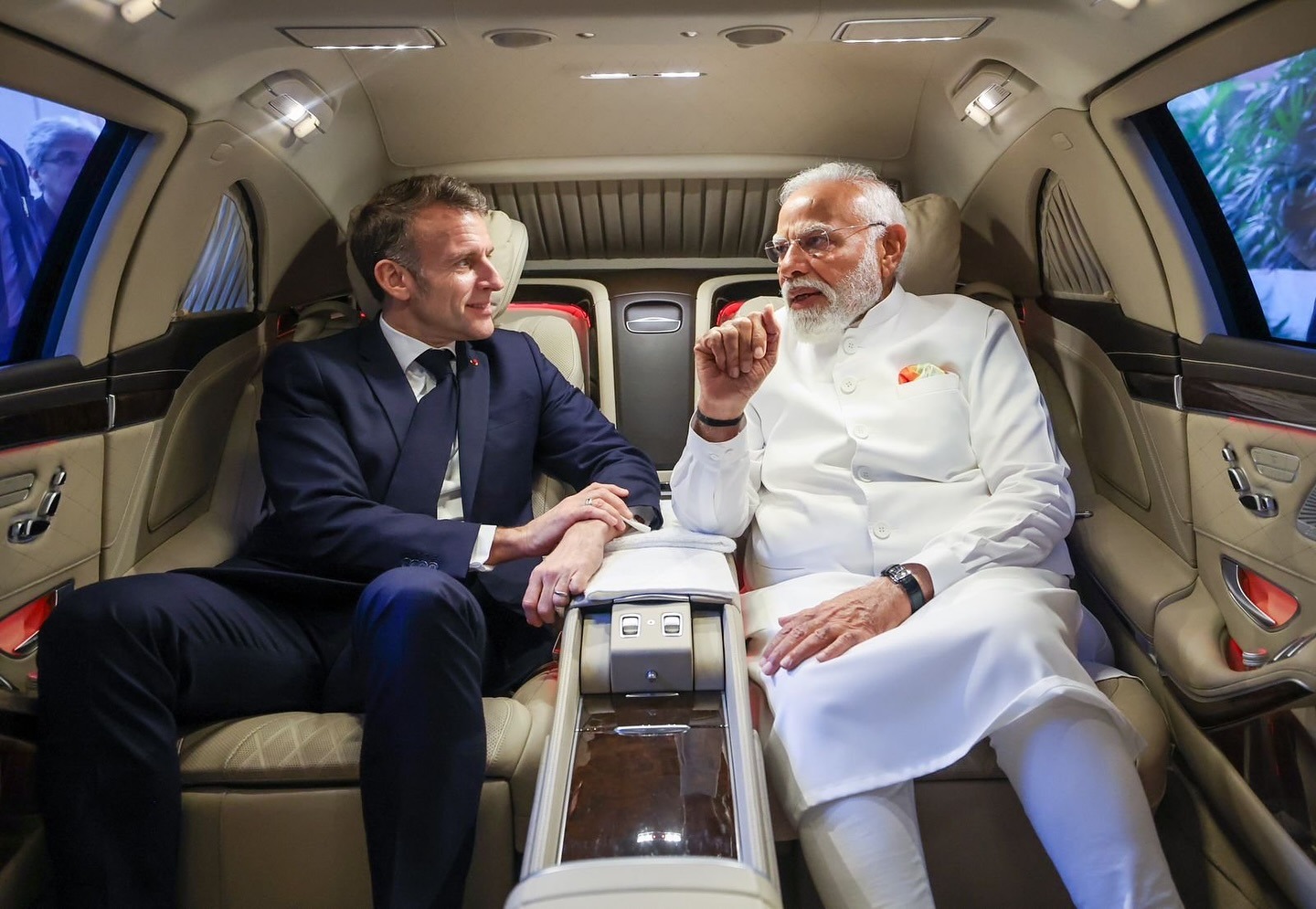 French President Emmanuel Macron meets Indian Prime Minister Narendra Modi.