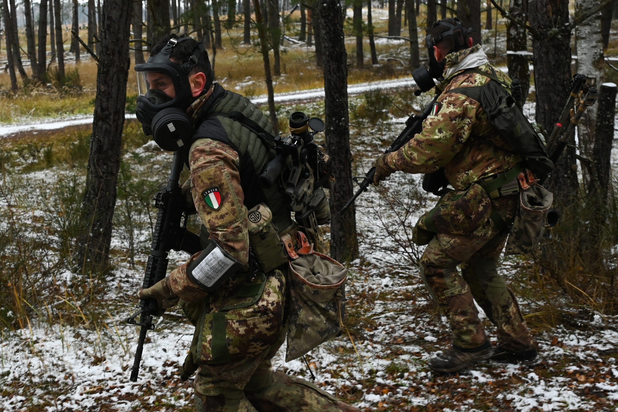 An Italian sniper team tactically moves to the next objective during the U.S. Army Europe and Africa European Best Sniper Team Competition in the 7th Army Training Command's Grafenwoehr Training Area, Grafenwoehr, Germany, Nov. 20, 2025. The USAREUR-AF EBST Competition held annually at 7th Army Training Command’s Grafenwoehr Training Area builds military readiness through realistic and challenging training scenarios, fosters military partnership and esprit des corps, and promotes NATO interoperability with Allied and Partner nations. (U.S. Army photo by Markus Rauchenberger)