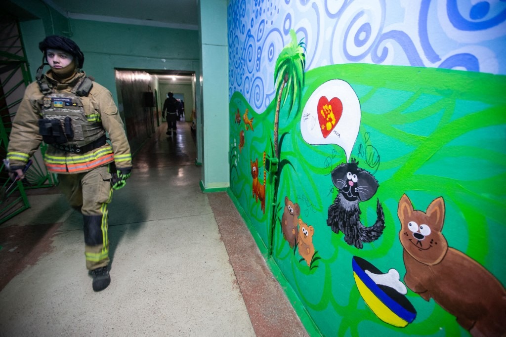 A Sumy firefighter is at a children's hospital after a Russian drone attack, on February 13, 2026.
