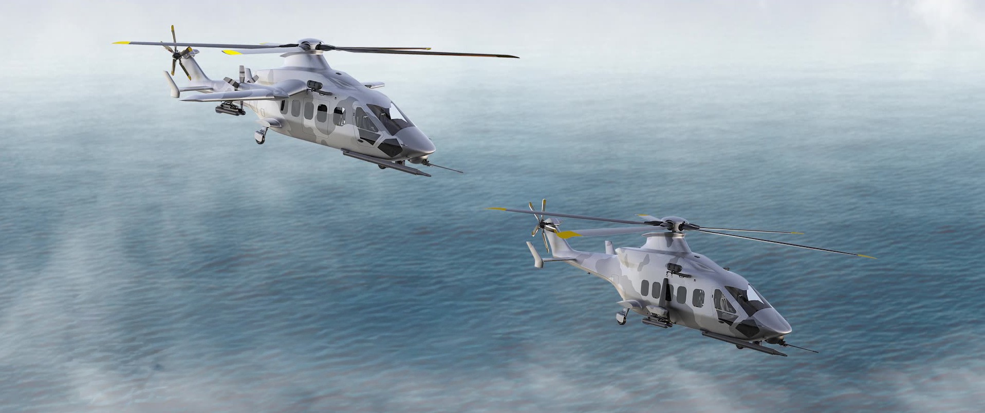 Two gray camouflage Airbus military helicopters fly in formation over a calm ocean beneath an overcast sky.