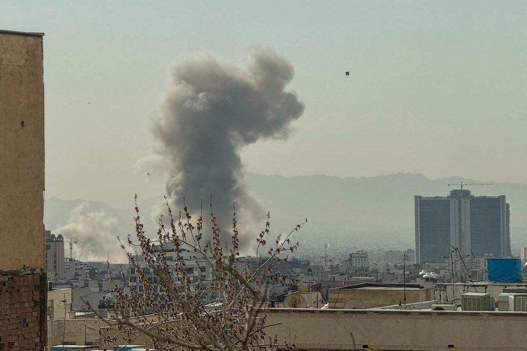 Smoke rises over Iran's capital, Tehran, after a reported explosion on February 28, 2026, following Israel's statement that it carried out a "preemptive strike."