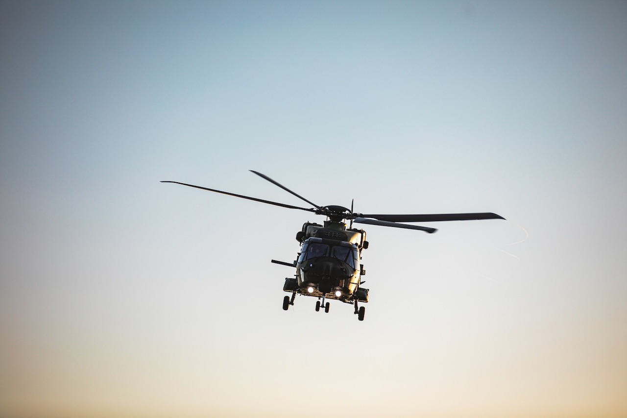 Finnish special operations forces conduct aerial maneuvers with an NH90 helicopter during Exercise SOUTHERN GRIFFIN 25