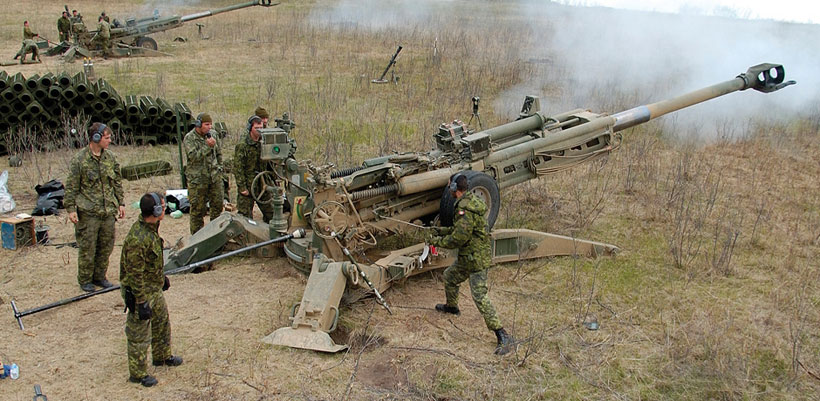 Canadian soldiers with the M777 Howitzer
