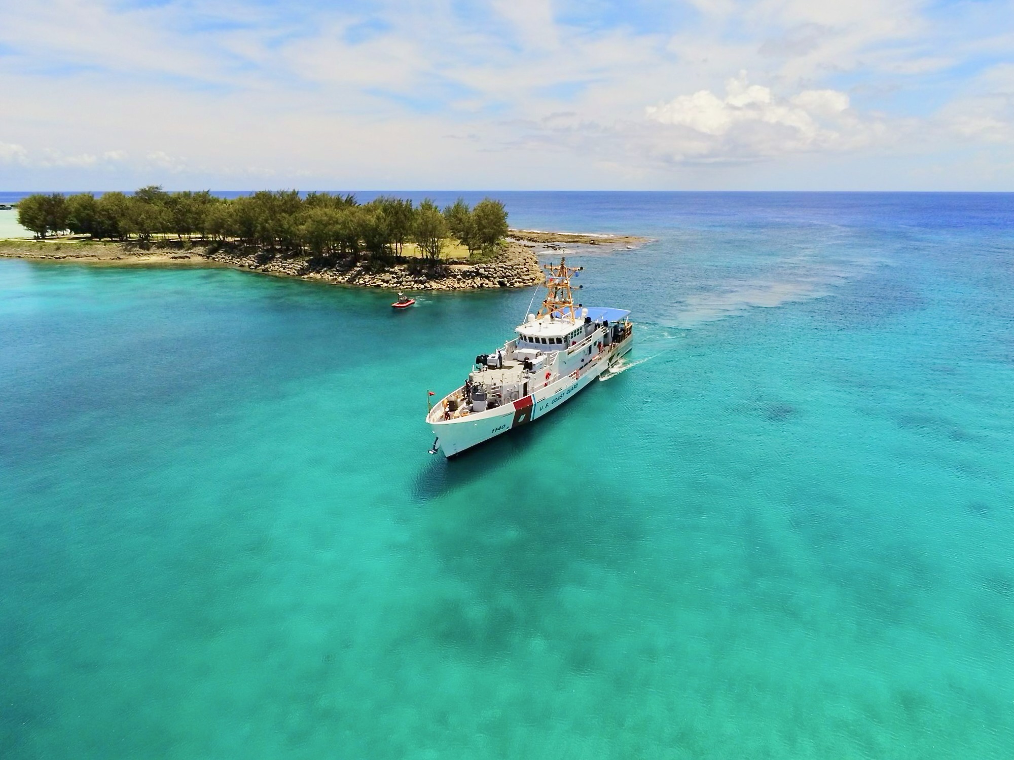 The USCGC Oliver Henry (WPC 1140) departs Rota, Commonwealth of the Northern Mariana Islands on June 9, 2025. The crew conducted a 22-day local patrol and training evaluation, reinforcing maritime security, upholding federal laws, and fostering community partnerships in the U.S. Exclusive Economic Zone around Guam and the Commonwealth of the Northern Mariana Islands. (U.S. Coast Guard photo by Petty Officer 2nd Class Jackson Collins)