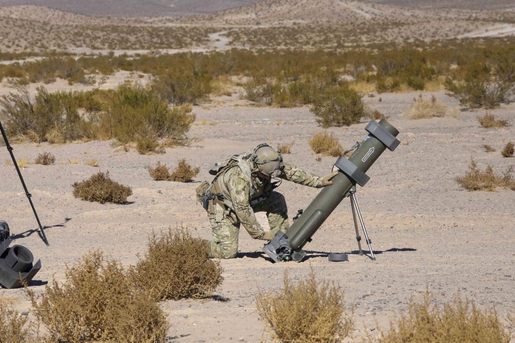 A U.S. Soldier assigned to 1st Infantry Division launches a HERO-120 loitering munition system