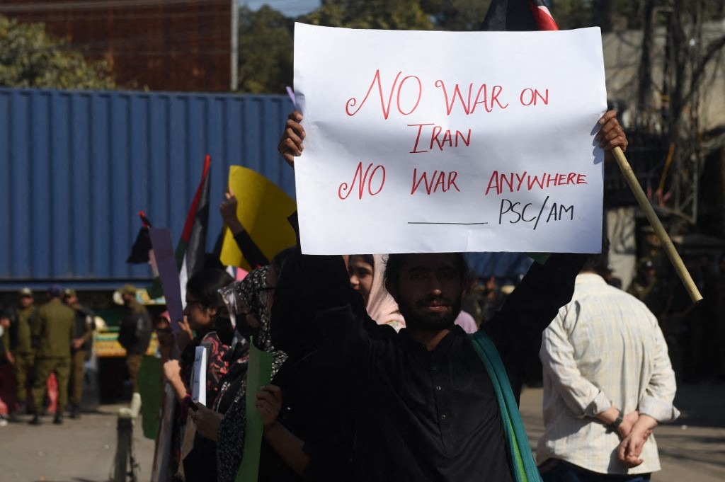 Members of Aurat March Lahore and the Progressive Students Collective (PSC) stage a protest demonstration outside the US Consulate at Shimla Pahari in Lahore, Pakistan, on March 3, 2026.