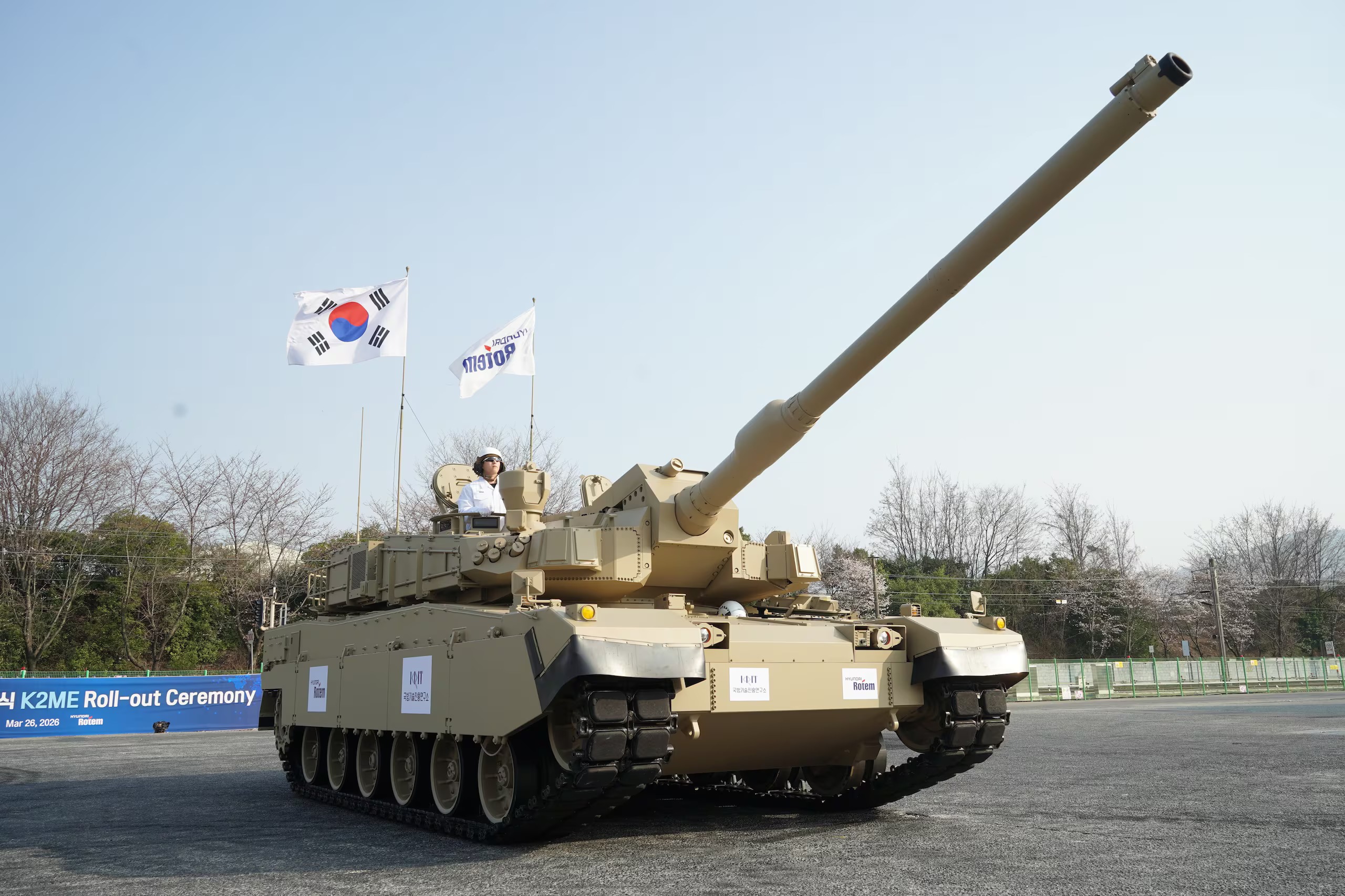 South Korean K2 Black Panther main battle tank kicking up dust during a high-speed field exercise, showcasing the platform's mobility and combat readiness