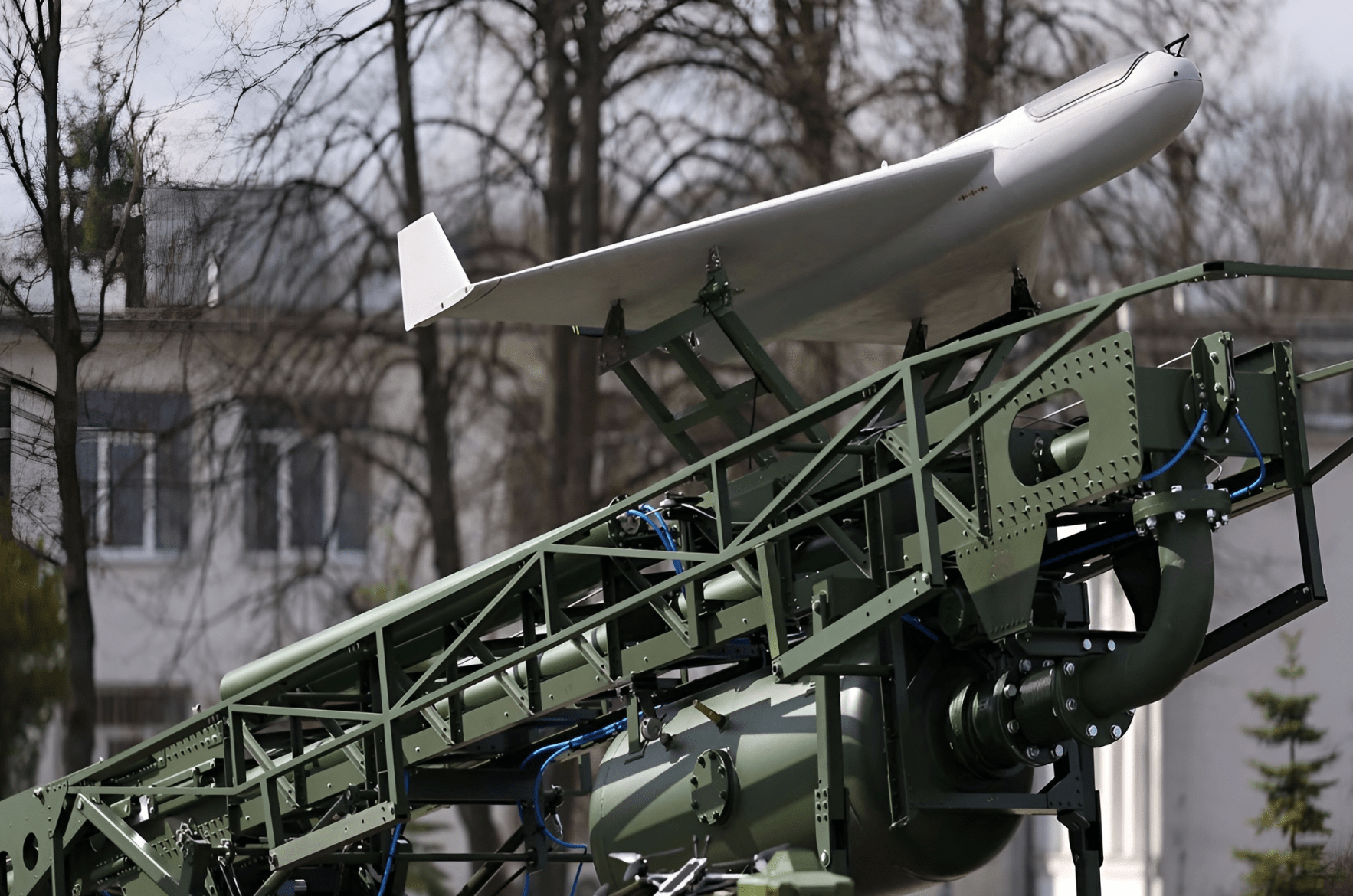 Poland PLargonia fixed-wing combat drone loaded on a green catapult launch system, highlighting Poland's push to field a domestically developed national UAV capability