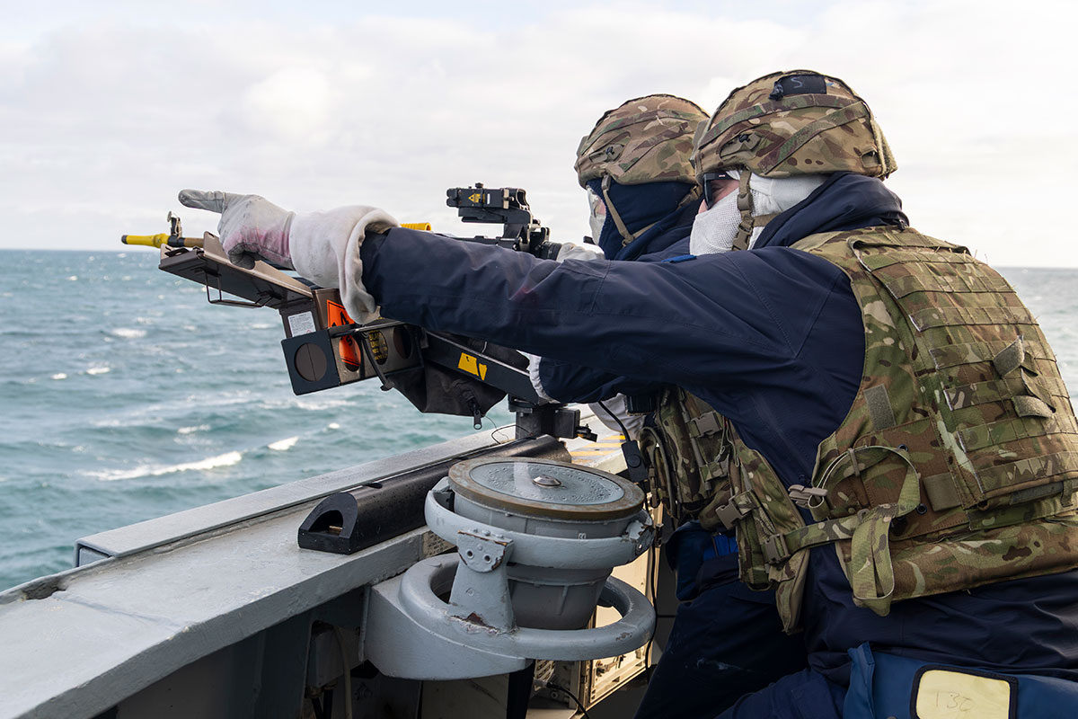 Soldiers onboard HMS Duncan take part in live fire exercises.