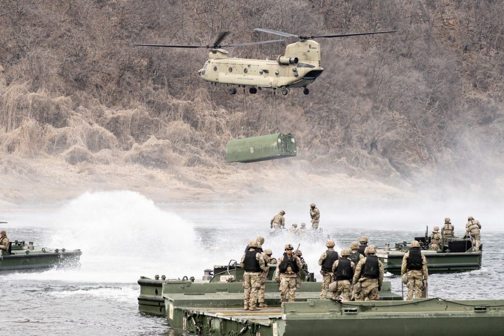 US Army soldiers conduct sling load operations in support of the 11th Engineer Battalion during Freedom Shield at an undisclosed location
