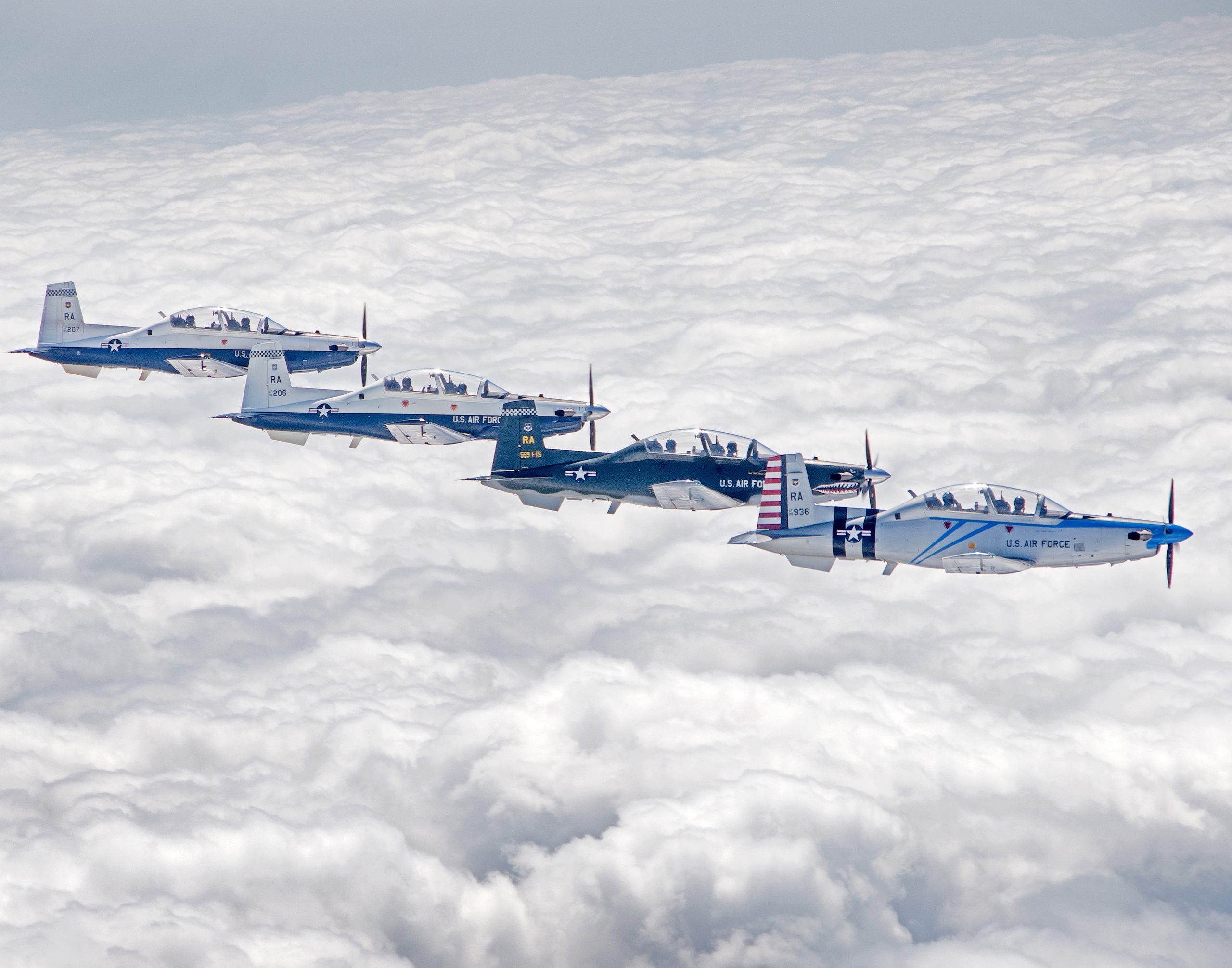 Instructor Pilots with the 340th Flying Training Group, 39th Flying Training Squadron, and 559th Flying Training Squadron flew a T-6 Texan II four-ship formation on Mar. 23, 2023, over Joint Base San Antonio-Randolph, Texas. The sortie also marked the final flight of Lt. Col. Mark Pasierb, former Undergraduate Flying Training program commander, who will have approximately earned a combined 6,000 flight hours in the C-5 Galaxy and T-6.