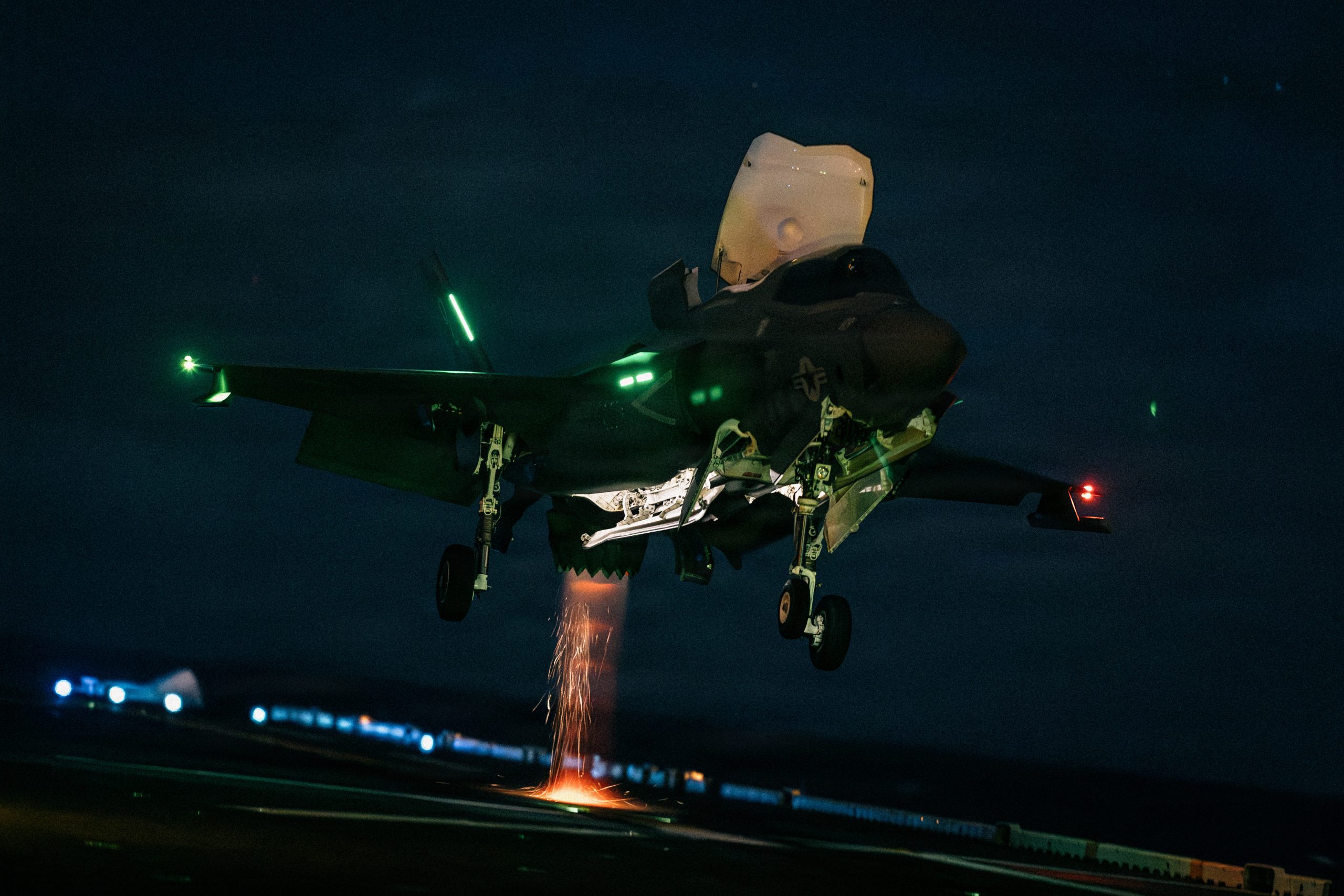 A U.S. Marine Corps F-35B Lightning II with Marine Fighter Attack Squadron (VMFA) 122, 11th Marine Expeditionary Unit, lands on the flight deck of Wasp-class amphibious assault ship USS Boxer (LHD 4) in the Pacific Ocean, March 28, 2026. The 11th MEU is currently underway aboard the Boxer Amphibious Ready Group in the U.S. 3rd Fleet area of operations demonstrating the United States’ long-term commitment to a free and open Indo-Pacific. (U.S. Marine Corps photo by Sgt. Joseph Helms)