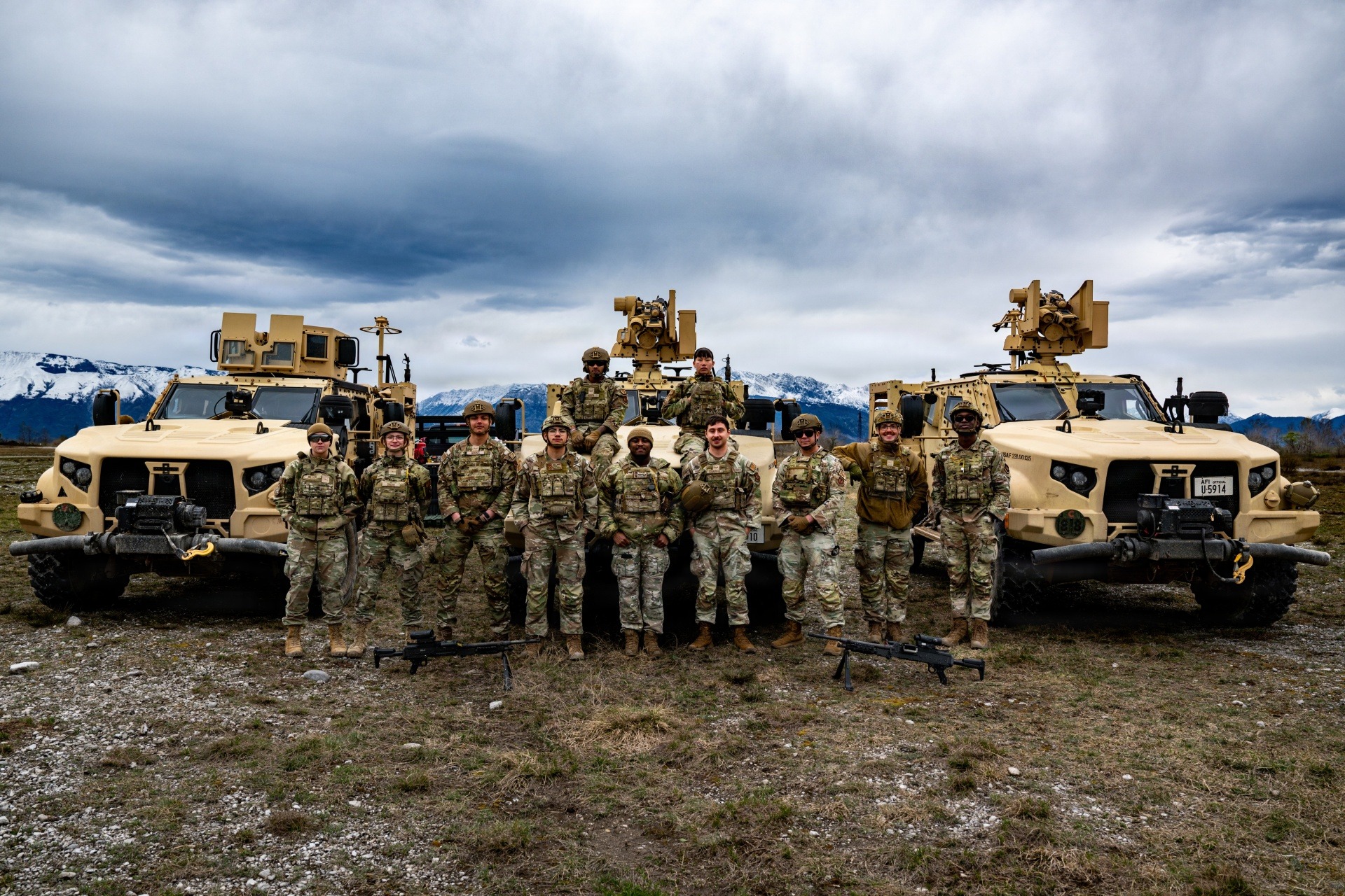 U.S. Airmen assigned to the 39th Security Forces Squadron pose for a group photo following the completion of a Common Remotely Operated Weapon Station certification course at Cellina Meduna Range, Italy, March 26, 2025. The course certified 10 Airmen from the 39th SFS on the CROWS, expanding base defense capabilities in the U.S. European Command area of responsibility. (U.S. Air Force photo by Staff Sgt. Thomas Sjoberg)