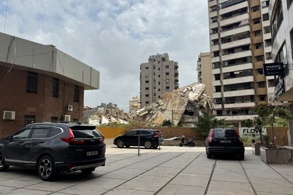 A collapsed building is seen in the Haret Hreik neighborhood of Dahieh in Beirut's southern suburbs on April 19, 2026.