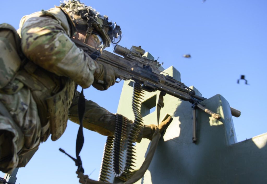 Integrated fire control optics combine rangefinding, ballistic calculation, and targeting aids—enhancing first-round hit probability under combat conditions.