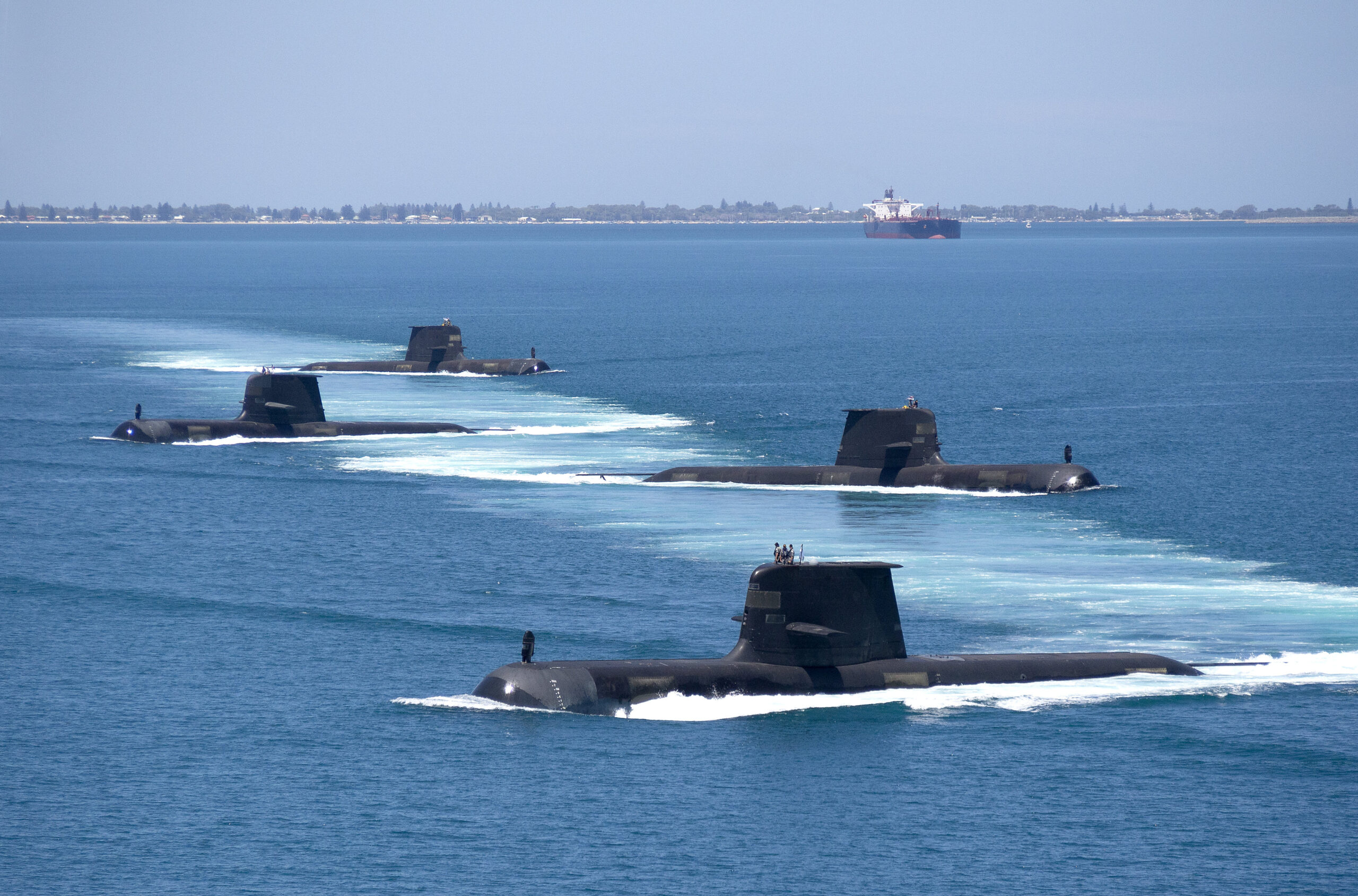 Collins Class submarines HMAS Collins, HMAS Farncomb, HMAS Dechaineux and HMAS Sheean in formation while transiting through Cockburn Sound, Western Australia. Collins Class submarines are an essential part of Australias naval capability, providing a strategic advantage in terms of surveillance and protection of our maritime approaches. *** Local Caption *** Royal Australian Navy Collins Class Submarines, HMAS Collins, HMAS Farncomb, HMAS Dechaineux and HMAS Sheean sail in formation while transiting through Cockburn Sound, Western Australia, in February 2019.