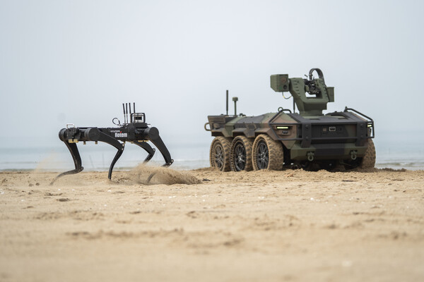 Hyundai Rotem’s HR-Sherpa unmanned ground vehicle and a quadruped robotic system during field operations testing. Photo: Hyundai Rotem