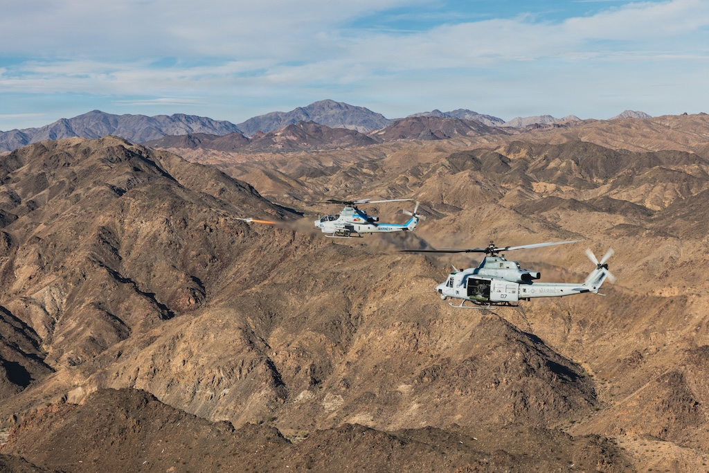 A U.S. Marine Corps AH-1Z Viper fires an Aim-9 Sidewinder