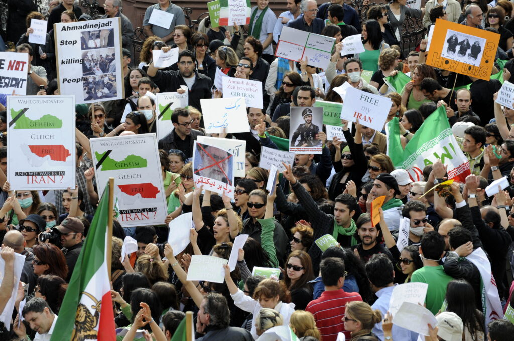 Hundreds of people demonstrate for a political change in Iran on June 16, 2009 in Frankfurt/Main, western Germany. Iran's bloody crackdown on post-election protesters raised an international outcry on June 16 over human rights abuses and demands that Tehran answer "serious questions" about the disputed poll. 