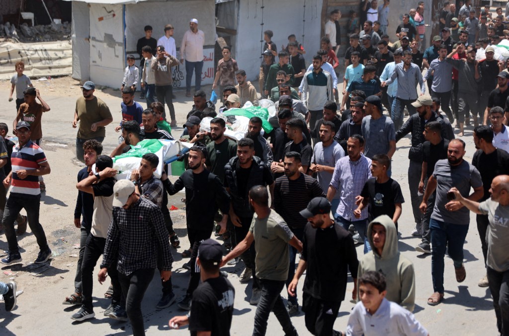 Mourners gather prior to the burial of Hamas leader Mohammed Odeh and other Palestinians during their funeral in Gaza City on May 27, 2026.