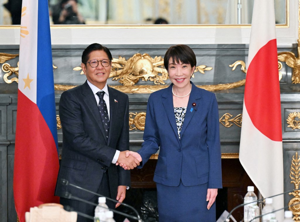 Philippine President Philippine President Bongbong Marcos (L) shakes hands with Japanese Prime Minister Sanae Takaichi during a meeting at the State Guest House in Tokyo on May 28, 2026.