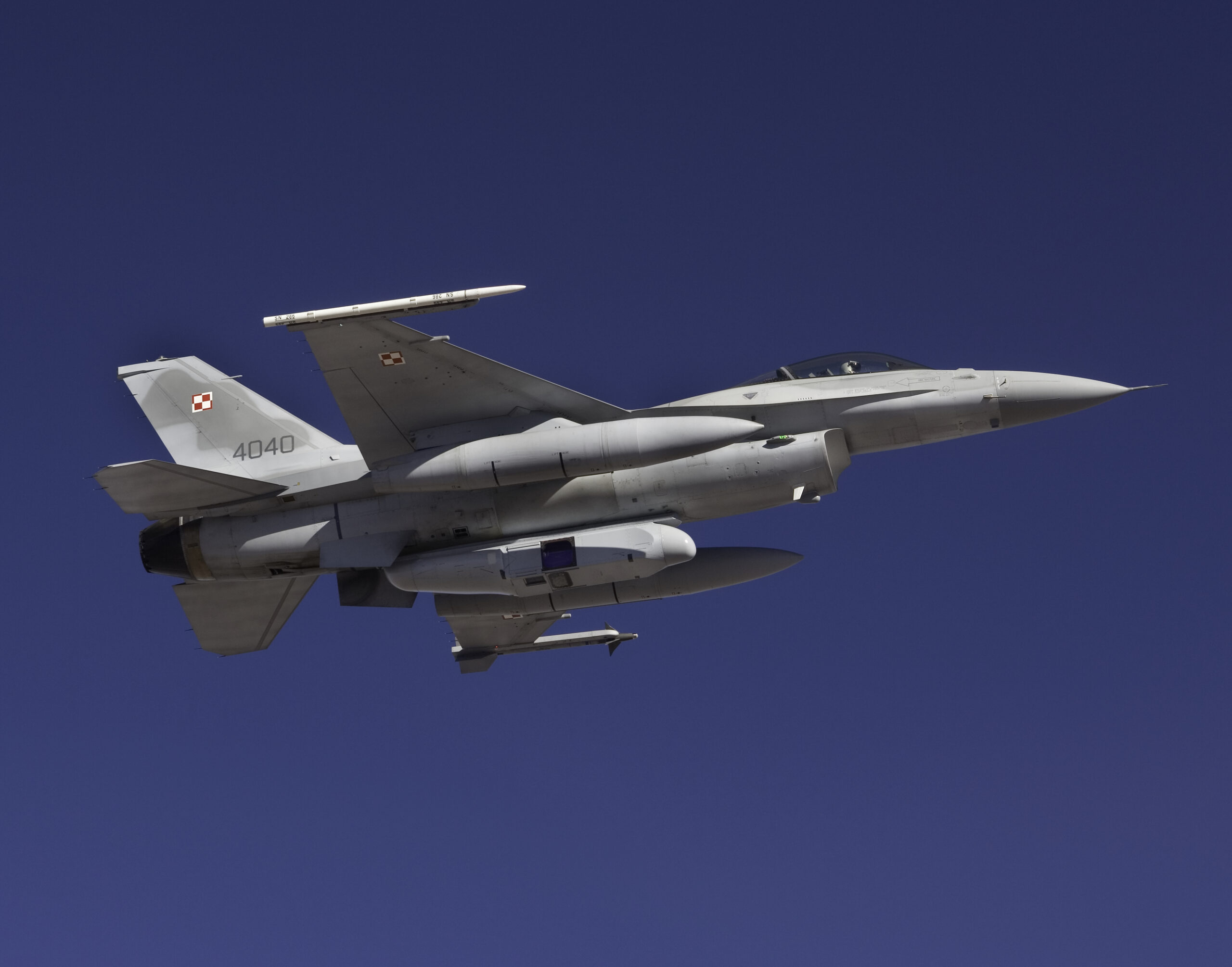 A Polish Air Force F-16 equipped with a reconnaissance pod