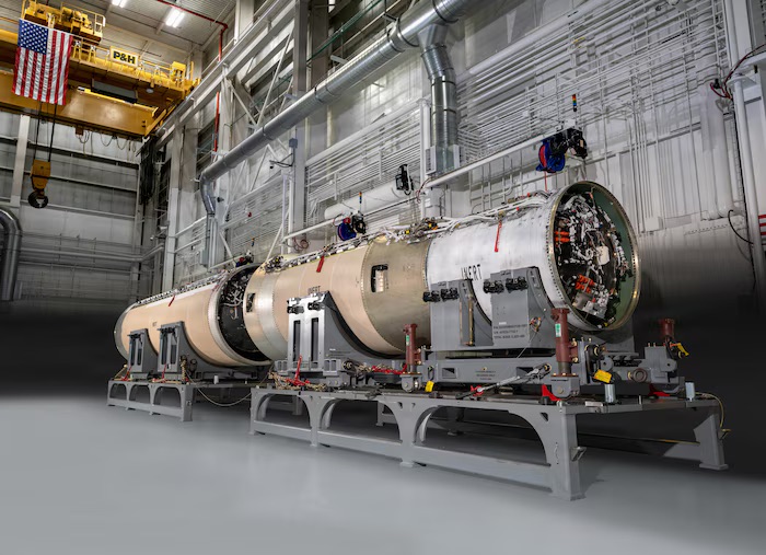 An undated photo of an LGM-35A Sentinel test booster, including stages-one, -two and -three solid rocket motors and both interstage mechanisms, is assembled.